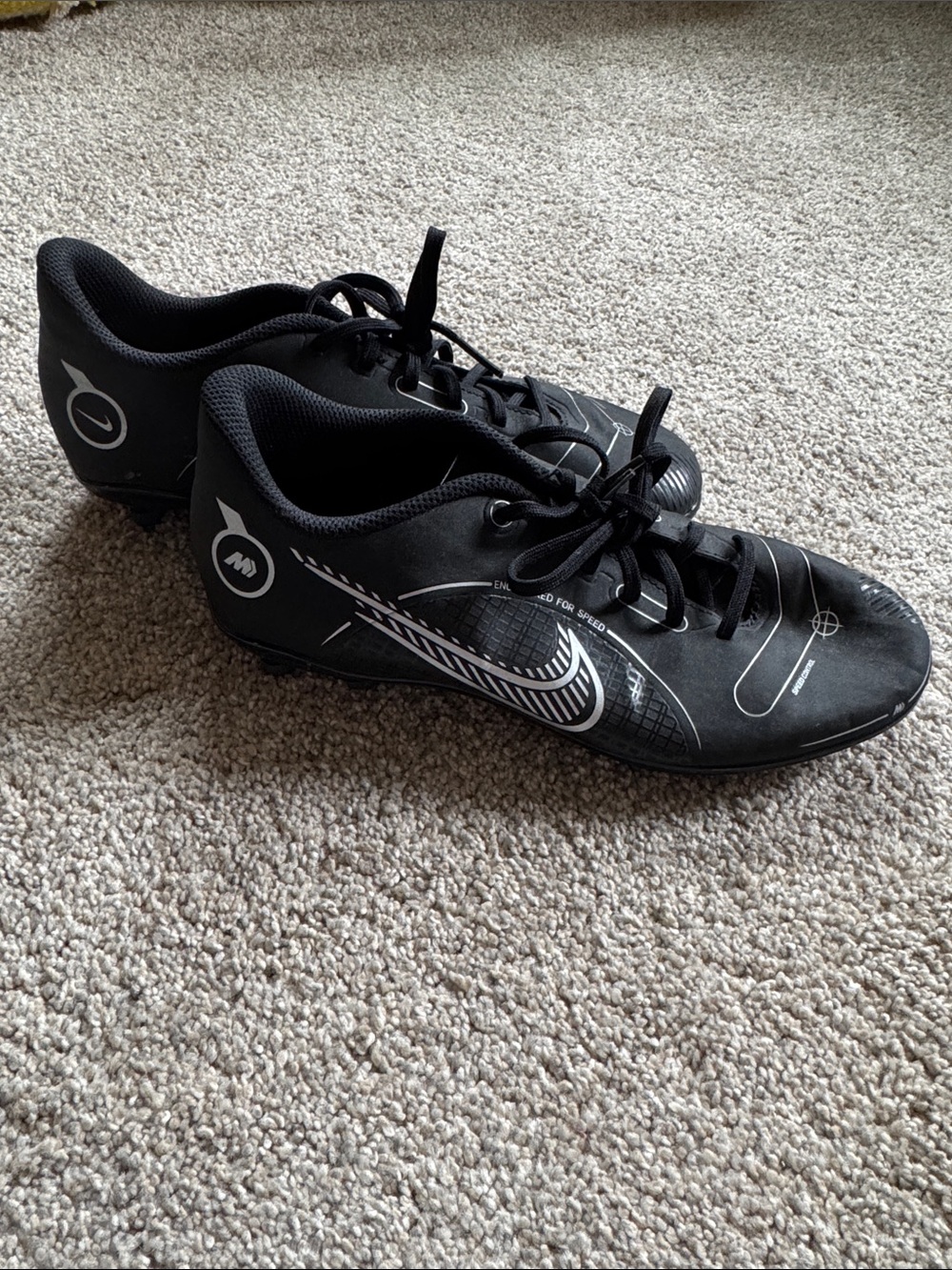 Nike Black Athletic Cleats with White Accents